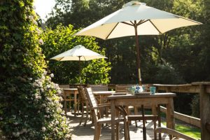 Glamping deck dining great outdoors Wales